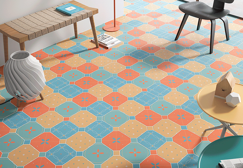 Suelo de azulejos de colores naranja, azul y amarillo.