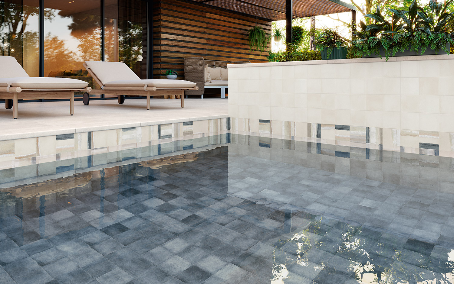 Una piscina muy mediterránea con porcelánico azul