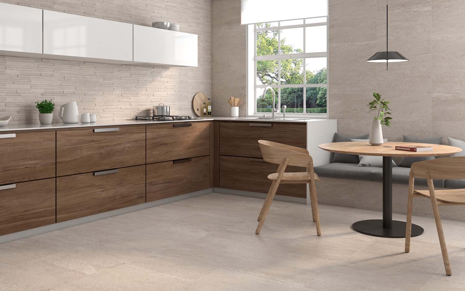 Una cocina de base beige y con mureto en la pared principal